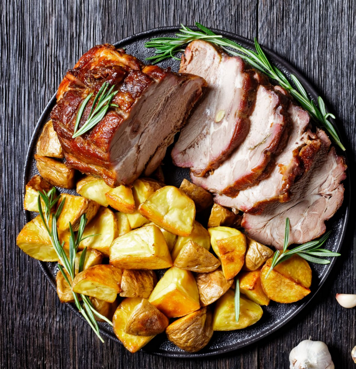 Rôti de porc aux pommes de terre
